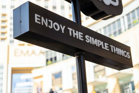 Sign that says "enjoy the simple things" 