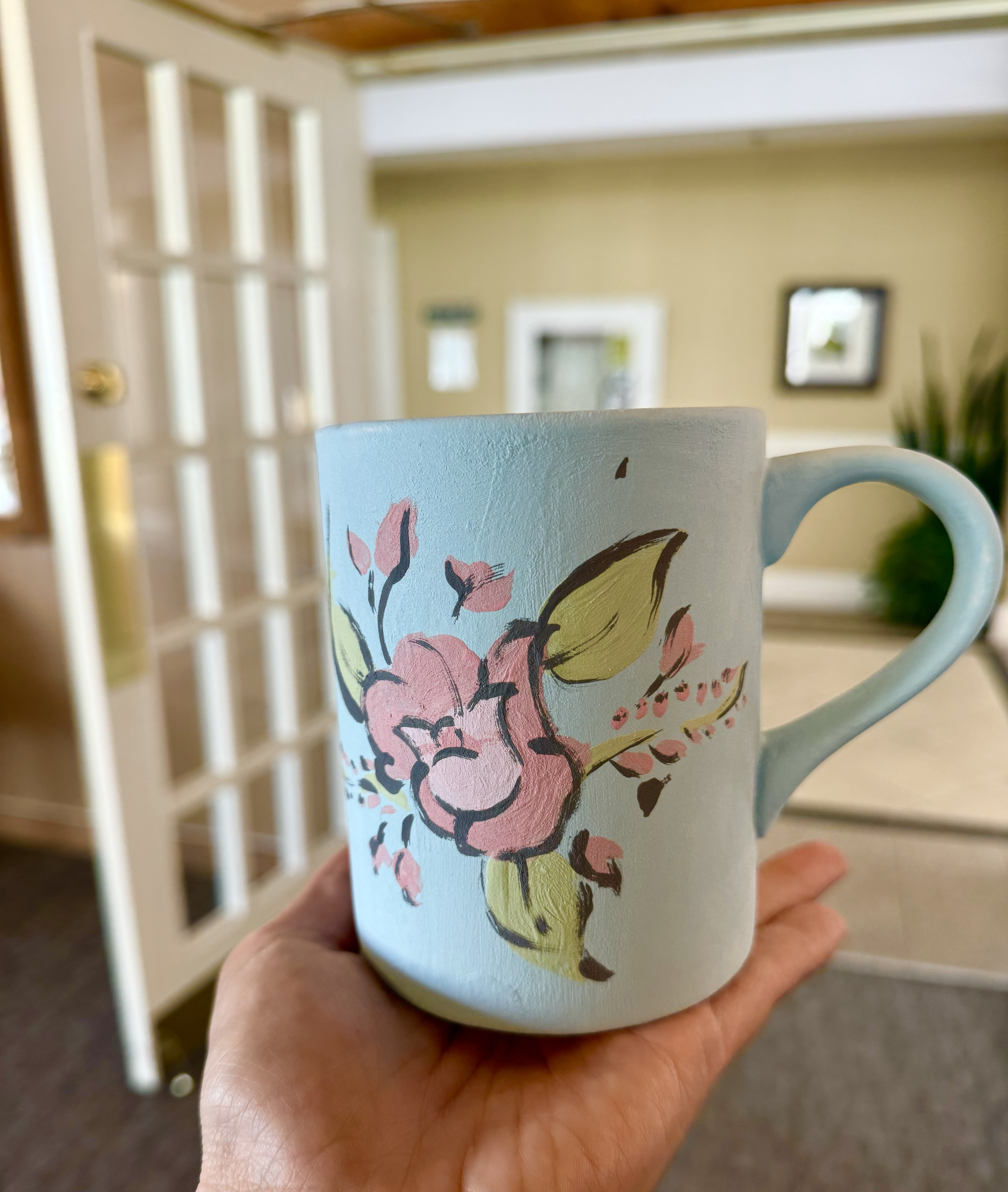 Image of mug painted by resident at Luther Village on the Park Waterloo