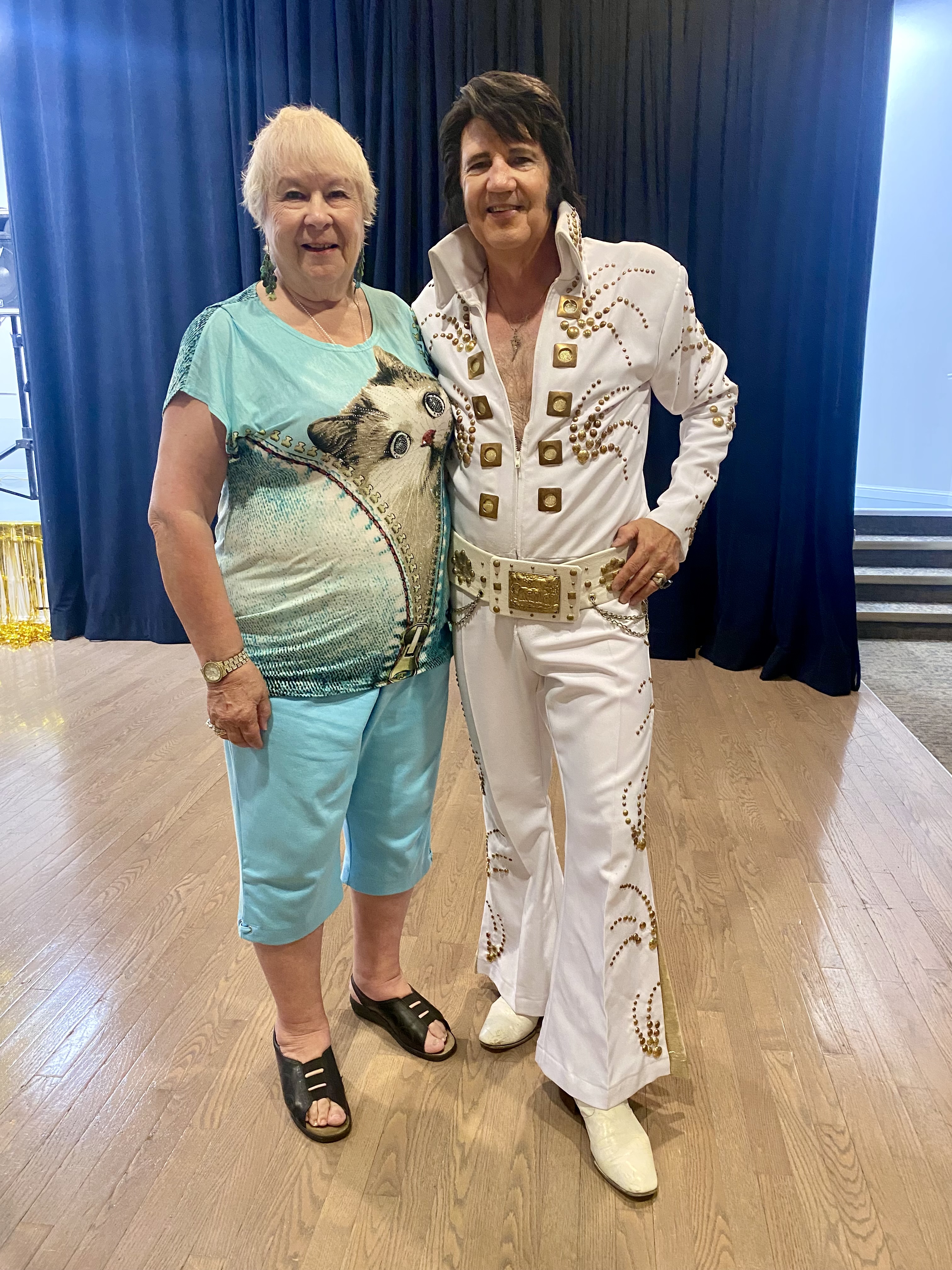 Resident at LVP stands next to Elvis performer. 