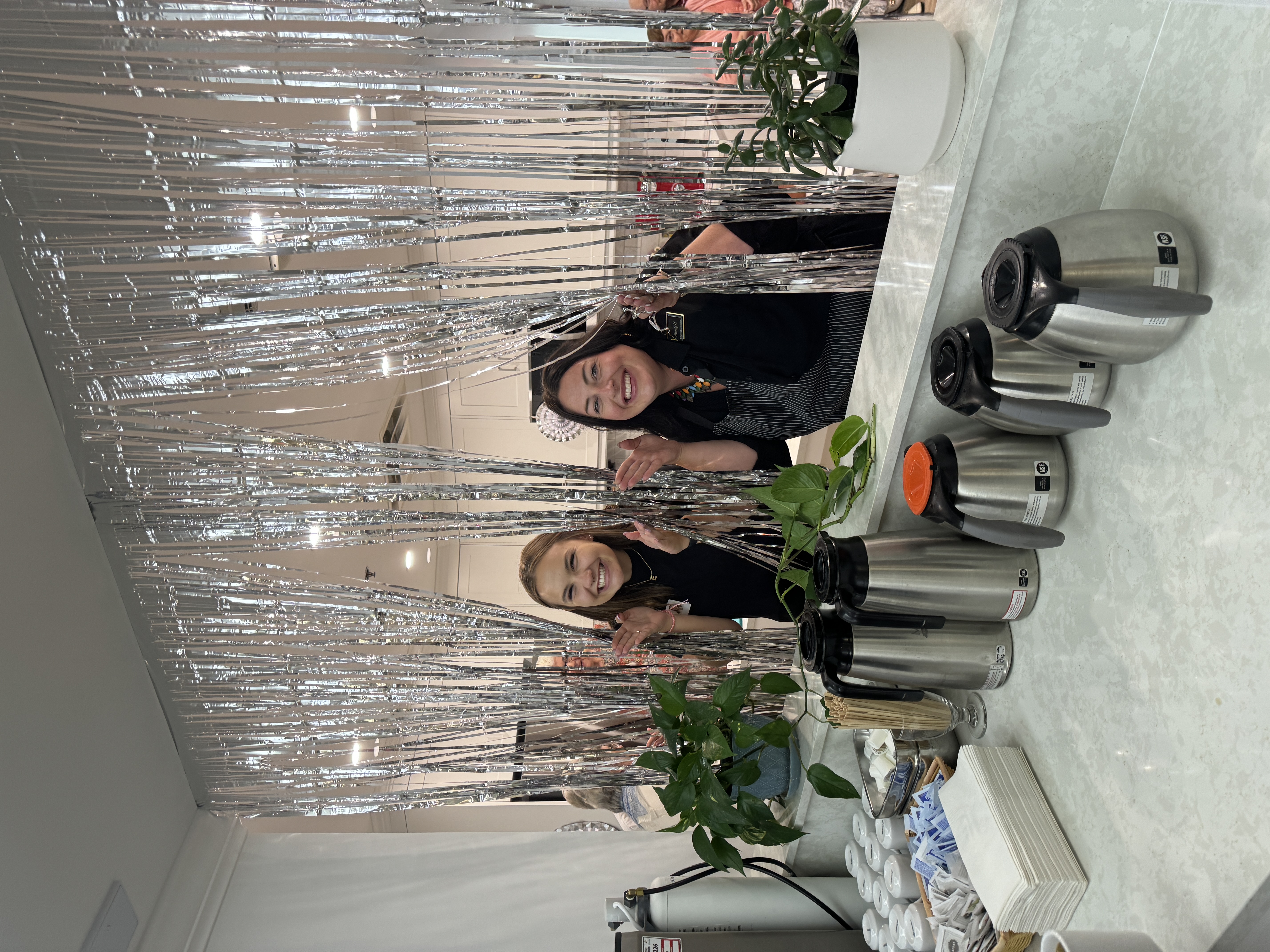 Staff at Luther Village stand in newly renovated kitchen together. 