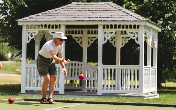 Resident playing games outdoors at Luther Village on the Park