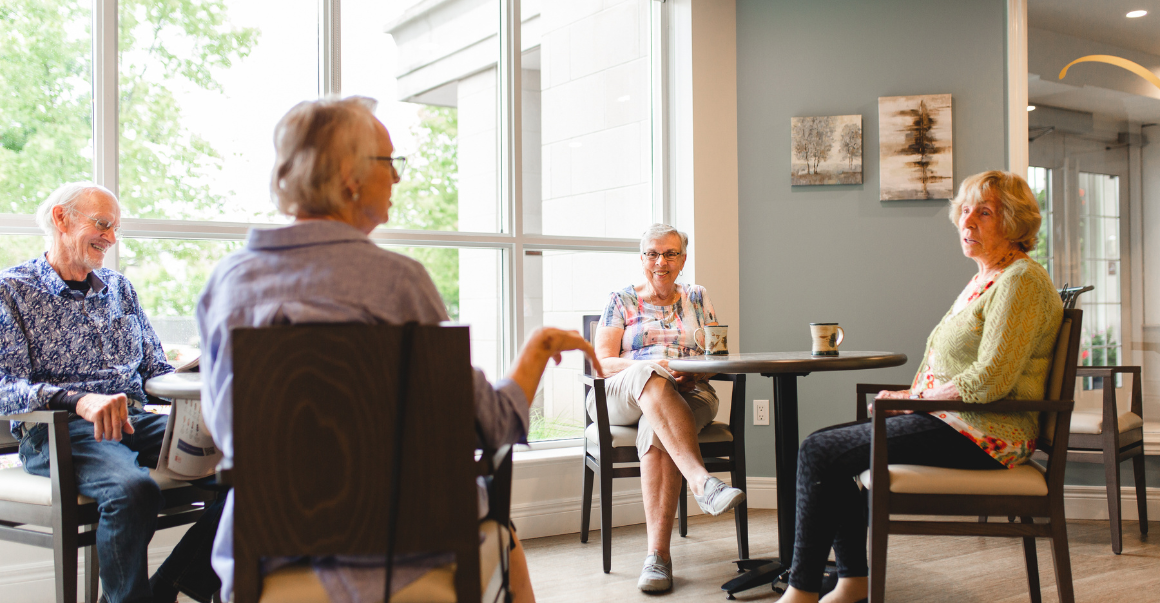 Retirement community members share conversation at Luther Village on the Park Life Lease.