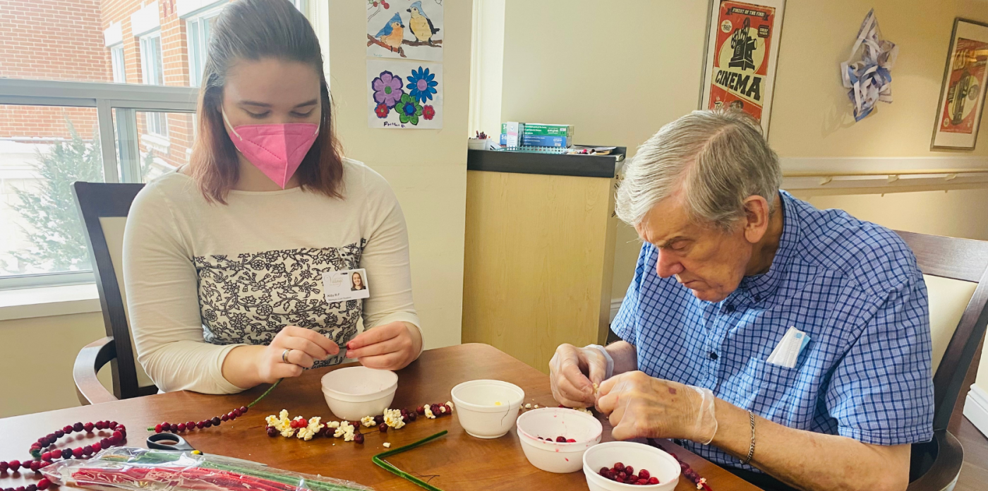 Resident doing crafts at Luther Village on the Park